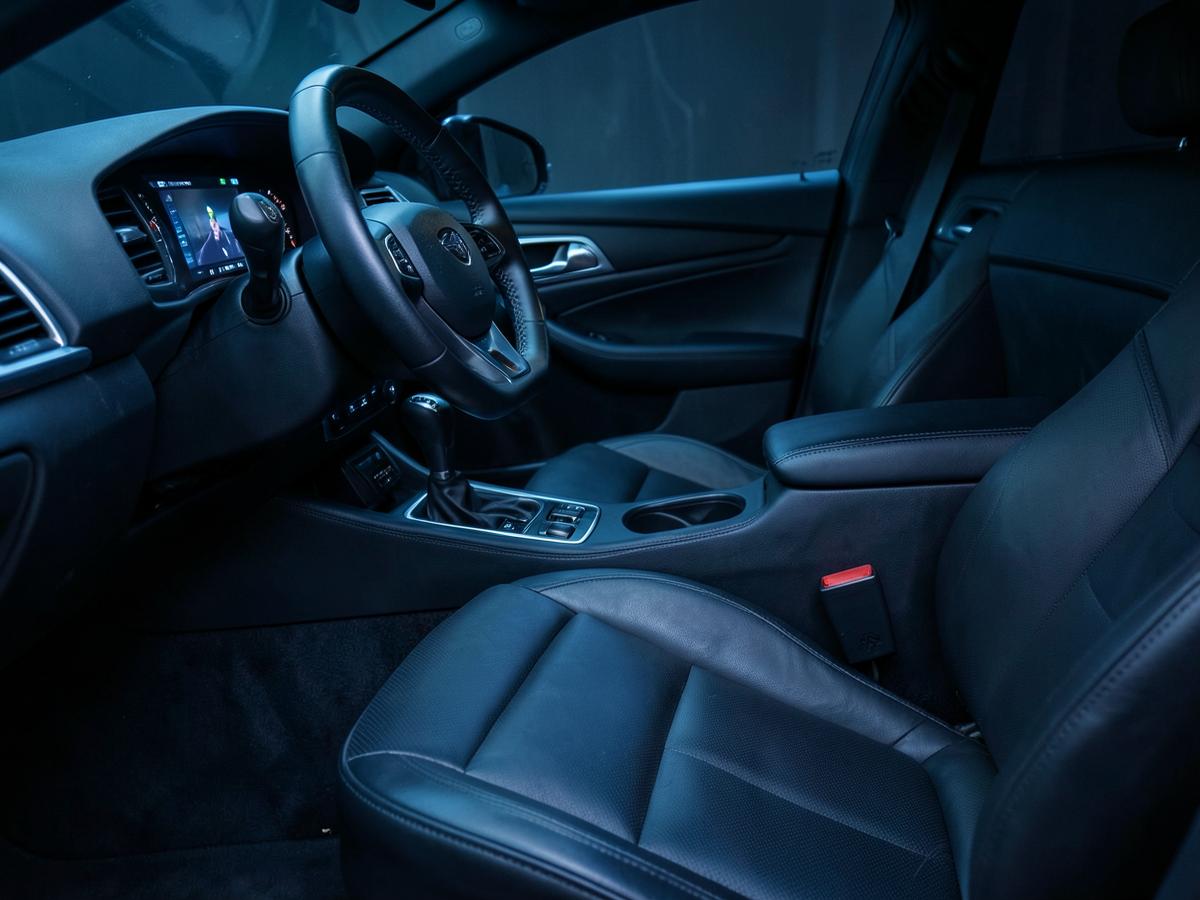 Steam cleaned leather car interior after an interior revitalization detail